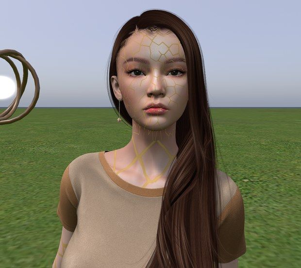 Tessel's face: long dark hair, and fine gold seams across the skin like mended porcelain.